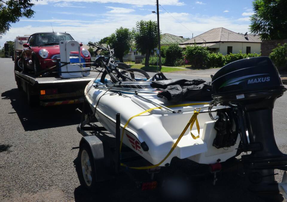 Seized: Two utes, a Mini Cooper and a jet boat, pictured here during raids in February, 2015, have been confiscated to the crown after a judge made an order during sentencing.
