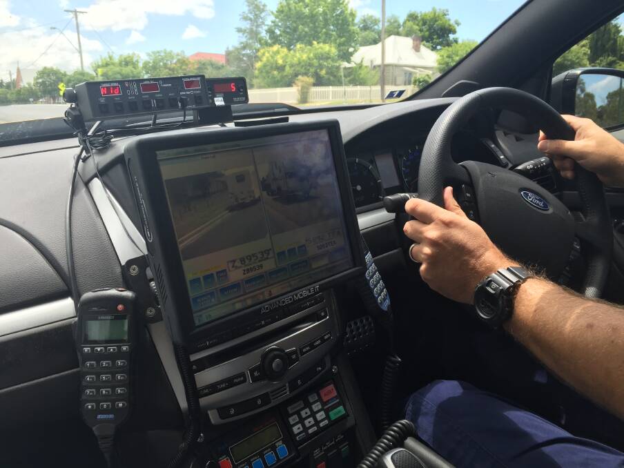 Touch of a button: The mobile number plate detection technology inside highway patrol cars means police can easily check for unregistered vehicles.
