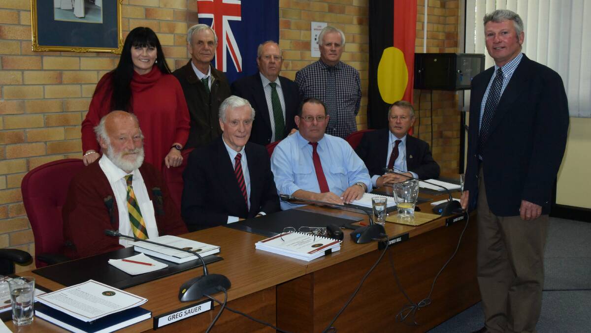 CLASS OF 2016: Tenterfield's new council comprises (standing) Bronwyn Petrie, Gary Verri, Tom Peters and John Macnish, and (seated) John Martin, Brian Murray, Mike Petrie and Don Forbes, with Peter Petty as mayor. (Deputy mayor Greg Sauer is absent.)
