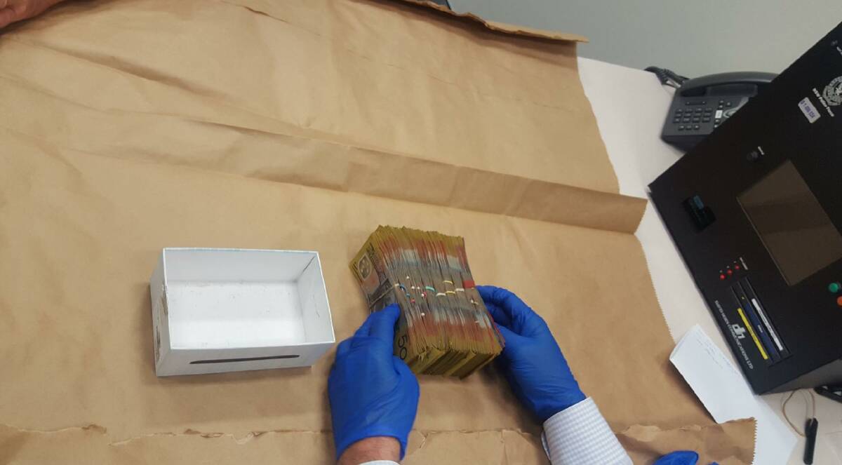 Money seized: Police have seized drugs, cash, pictured, phones and other goods as part of Strike Force Delaney, set-up by Tamworth-based detectives and the Target Action Group. Photo: Supplied