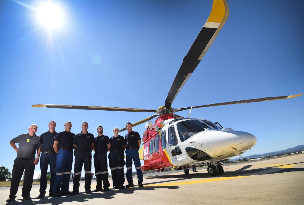 All smiles: From left, Max Cathcart, Matthew Wallace, Paul Johnson, Sean Maher, Dylan Cross, Jodie Reardon and Shane Harris with the new chopper in Tamworth. Photo: Gareth Gardner 