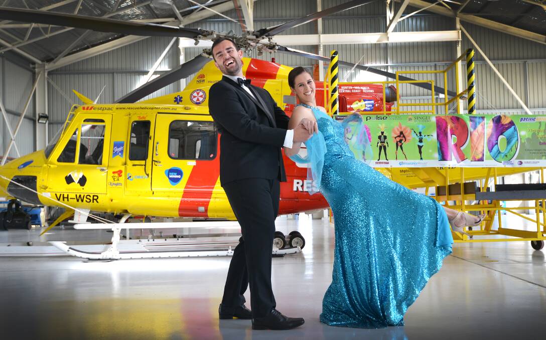 Let's go to Rio: The Westpac Helicopter Service's Mick Wilson and Taylor Singh are looking forward to the party. Photo: Barry Smith 