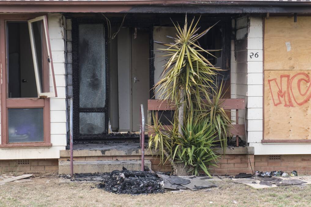 Charges laid: The teen is charged with offences stemming from four fires in the Coledale area in early January, including this one in Bourne Street. Photo: Peter Hardin 