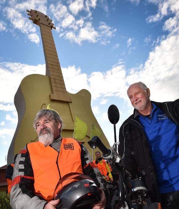 Journey of a lifetime: Hobart's Malcolm McGinn, left, and Eric Myers stop off in Tamworth as part of their trek around Australia for prostate cancer awareness. Photo: Gareth Gardner 250816GGG03