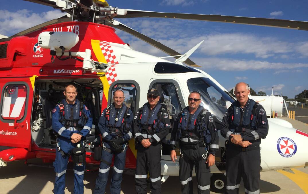 Takeoff: The Tamworth-based crew of pilots and medical staff with the new $18 million Augusta helicopter that will service the New England North West.  