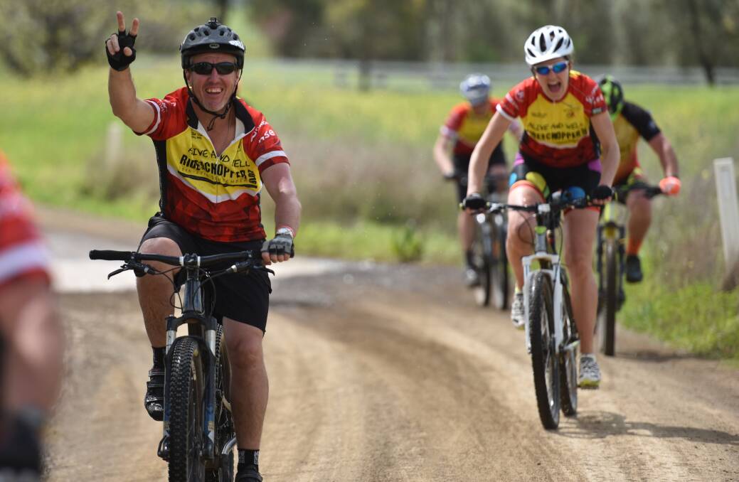Rod Powell from Wollongong, left, leads Breanna Chillingworth, back. Photo: Gareth Gardner