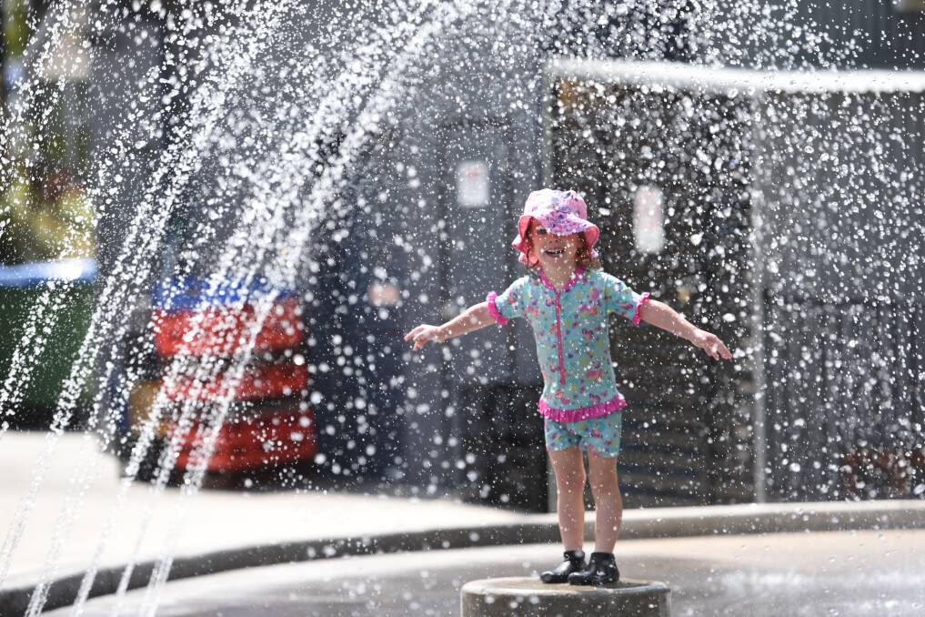 Beating the heat: Little Millah cools off on Friday. Photo: Gareth Gardner 