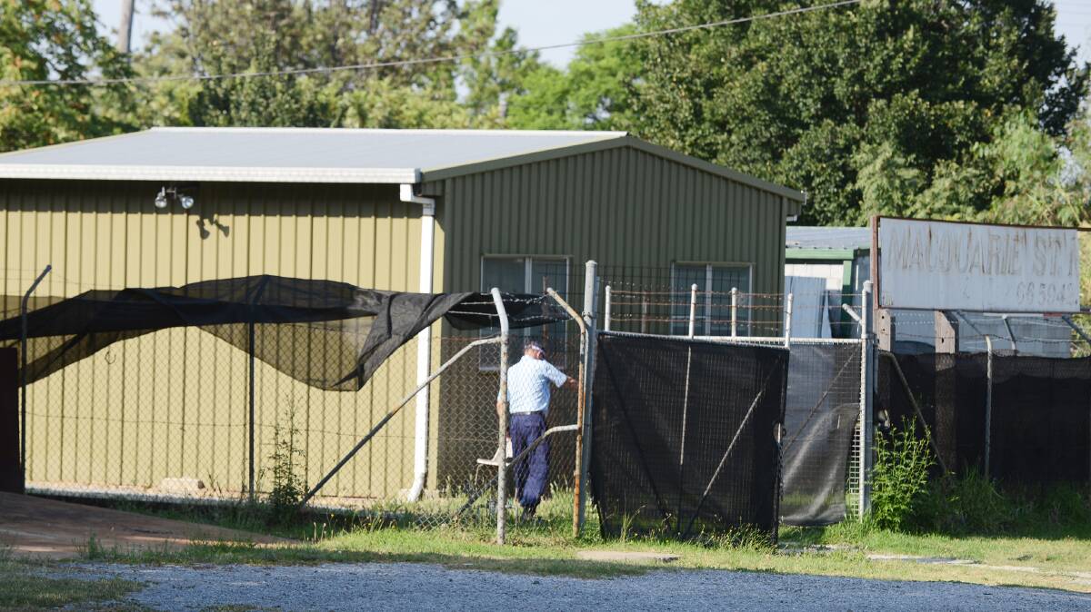 Rebels bust: Tamworth police at the Rebels' OMCG clubhouse in East Tamworth on March 10, 2015. Photo: Barry Smith