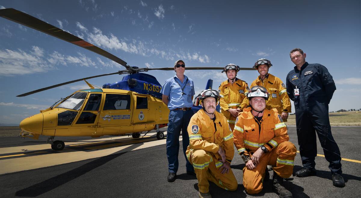 RFS ready: Pilot Nathan Payne, back left, Tristan Laurie, Martin Siddons, winch operator Nathan Pollard, Jim Crosbie, front left, and Dave Ormsby. 