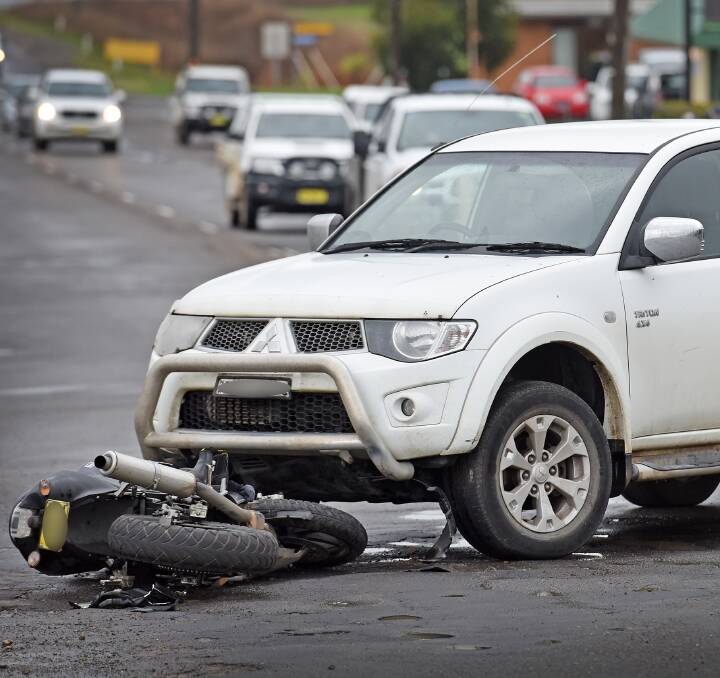 CRASH SCENE: Police shut Dampier St at the intersection of Wallamore Rd for several hours on Tuesday while they examined the area where the Triton and bike collided. Photo: Gareth Gardner 230816GGA03