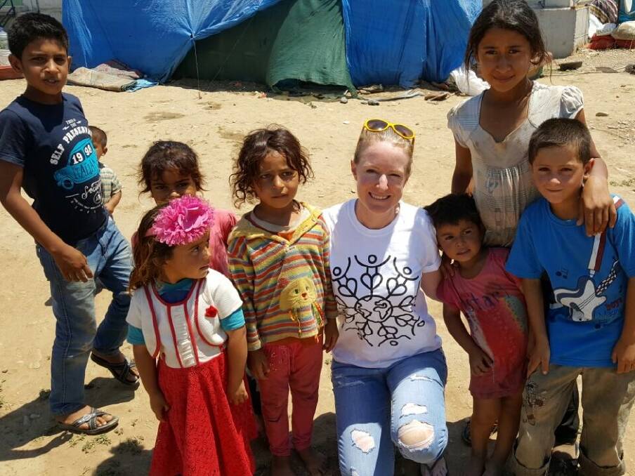 Bound for overseas: Kelli Scott in a Syrian camp near Izmir in Turkey. 