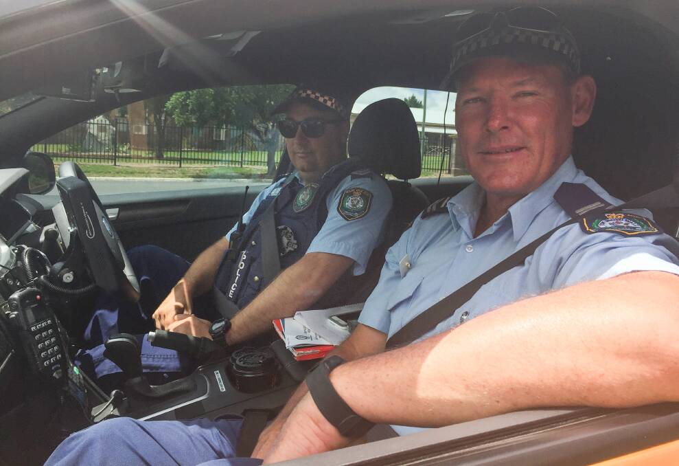 Hitting the road: Sergeant Michael Buko and Leading Senior Constable Dave Hodson are just two of dozens of highway officers policing the roads ahead of Christmas.