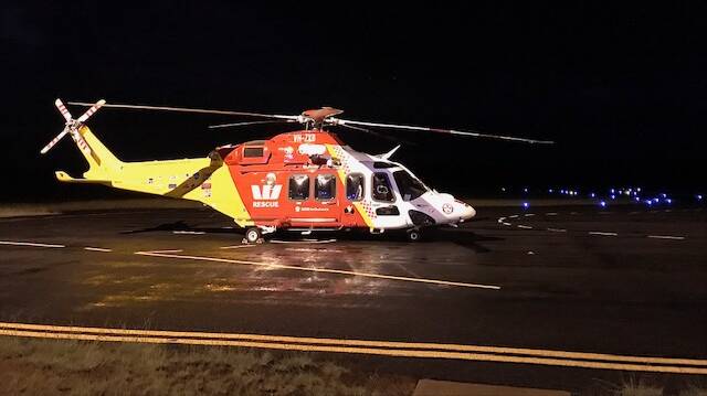 Emergency mission: The Westpac Rescue Helicopter landed at Inverell Airport before flying one injured woman to hospital in Tamworth. Photo: Westpac Rescue Helicopter