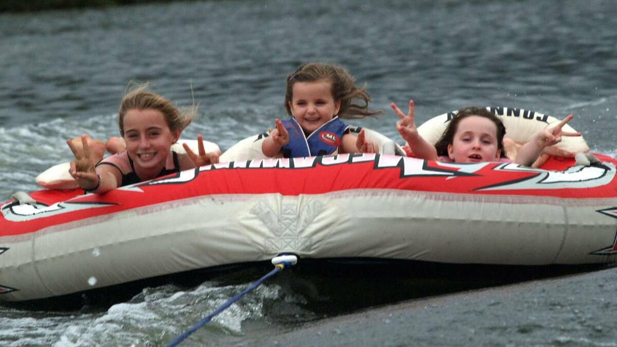 Water babies: From left, Mykenzie Semple, Talani Smith and Molly Smith took part in the special waterskiing marathon for charity at Chaffey Dam in 2012.