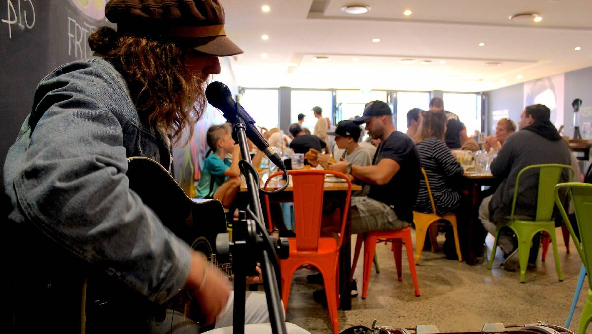 The crooning vocals of local artists keep crowds entertained as they enjoy their burgers