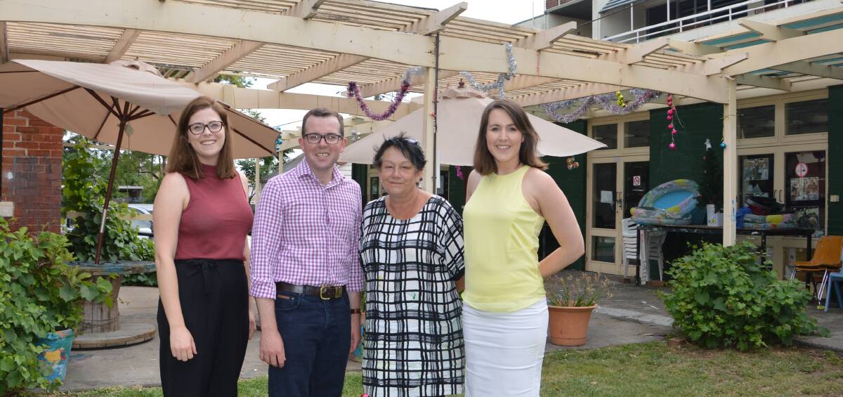 BIG PLANS: Moree Plains Gallery curator Hannah Williamson, Northern Tablelands MP Adam Marshall, gallery education officer Janelle Boyd and gallery director Vivien Clyne inspect the verandah area and discuss grant funding to put a new insulated steel roof in its place.