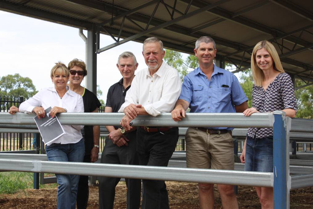 Debbie Watson (Shenhua Watermark), councillor Gae Swain, Gerry McDonald (Shenhua Watermark), councillor Owen Hasler and Gunnedah Show Society's George Truman and Helen Cygan have plenty of room to move in the new stable.