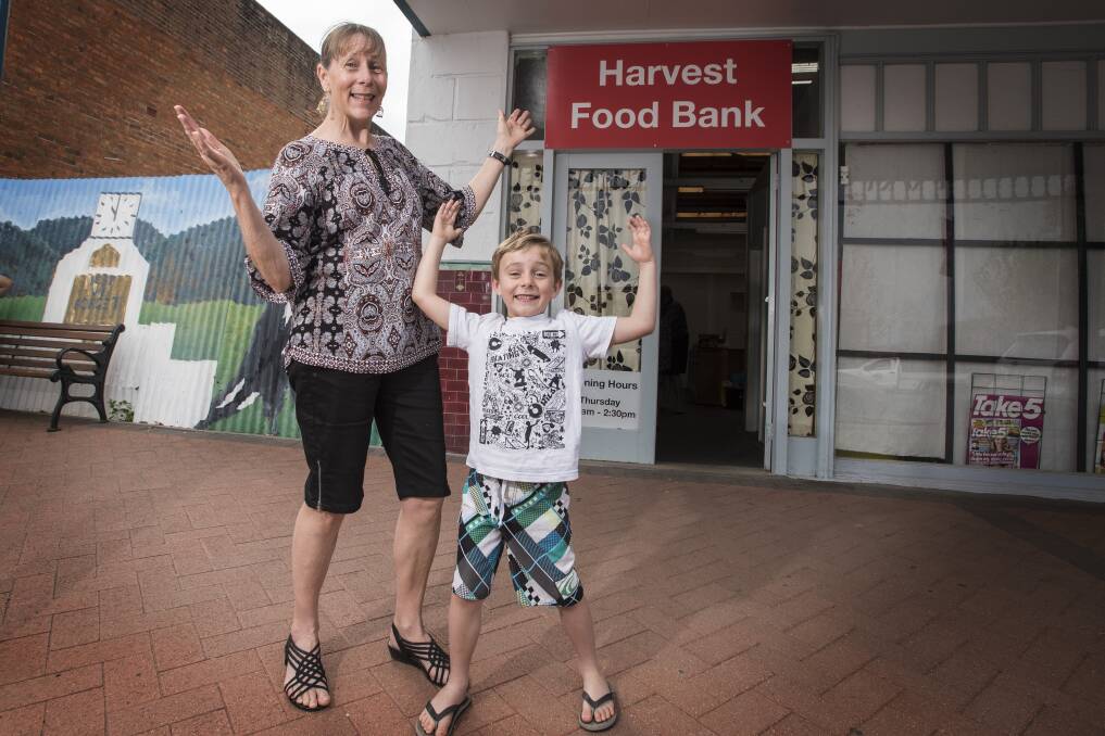 NEW VENTURE: Phyl Nichols and her grandson Toby Woolley are keen beans about Werris Creek's new food bank. Photo: Peter Hardin