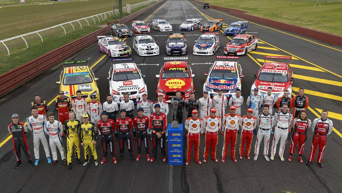 Supercars Championship drivers and their co-drivers posing for a photographs with their cars decorated in retro livery ahead of Retro Round at the Wilson Security Sandown 500, at Sandown Raceway in Springvale, Victoria, Thursday, September 14, 2017. The Sandown 500 kicks off the Pirtek Enduro Cup, which includes the Supercheap Auto Bathurst 1000 on October 8. (AAP Image/Edge Photographics