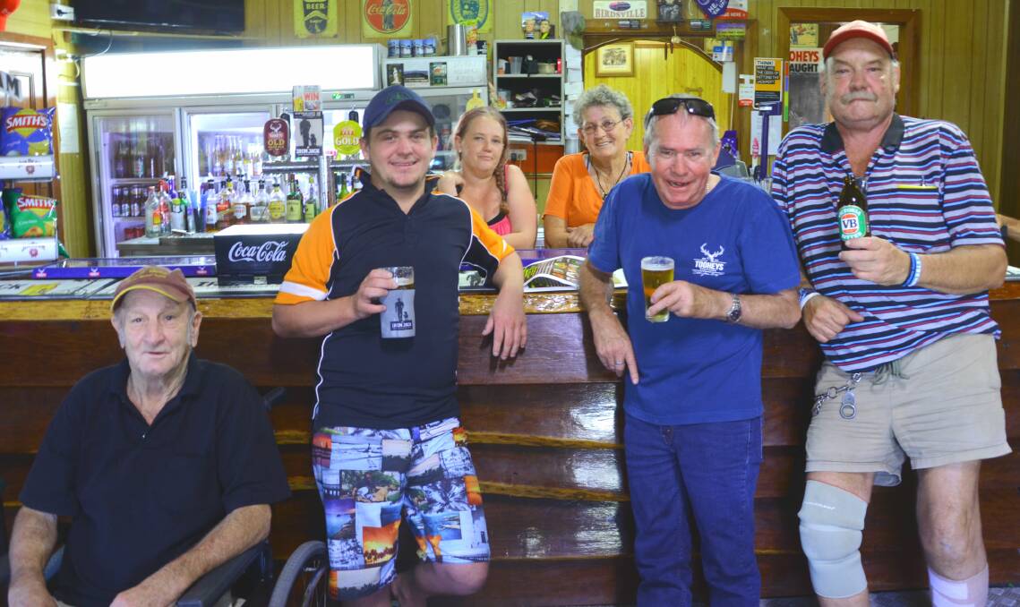 JOKES ON US: Tambar Springs residents have a beer in the Royal Hotel as "beer is safer than water" following E.coli being detected in the village's drinking water. Photo: Billy Jupp