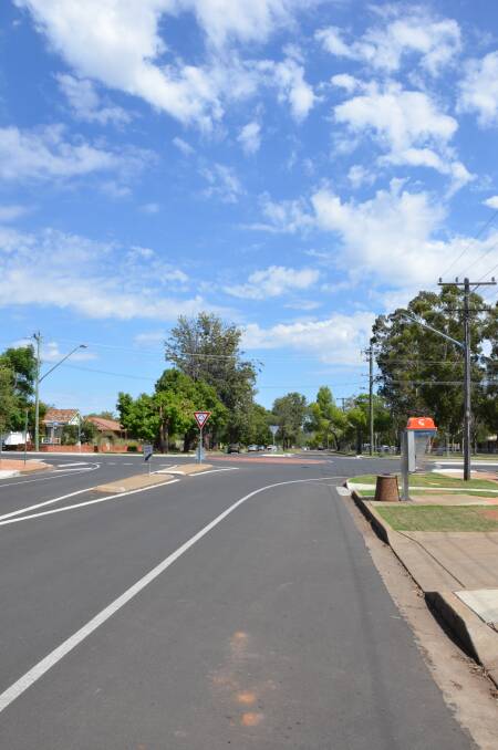 LIGHT IT UP: The Hunter and Marquis Street roundabout now has new street lamps capable of producing twice the lighting of the former lamps. Photo: Billy Jupp