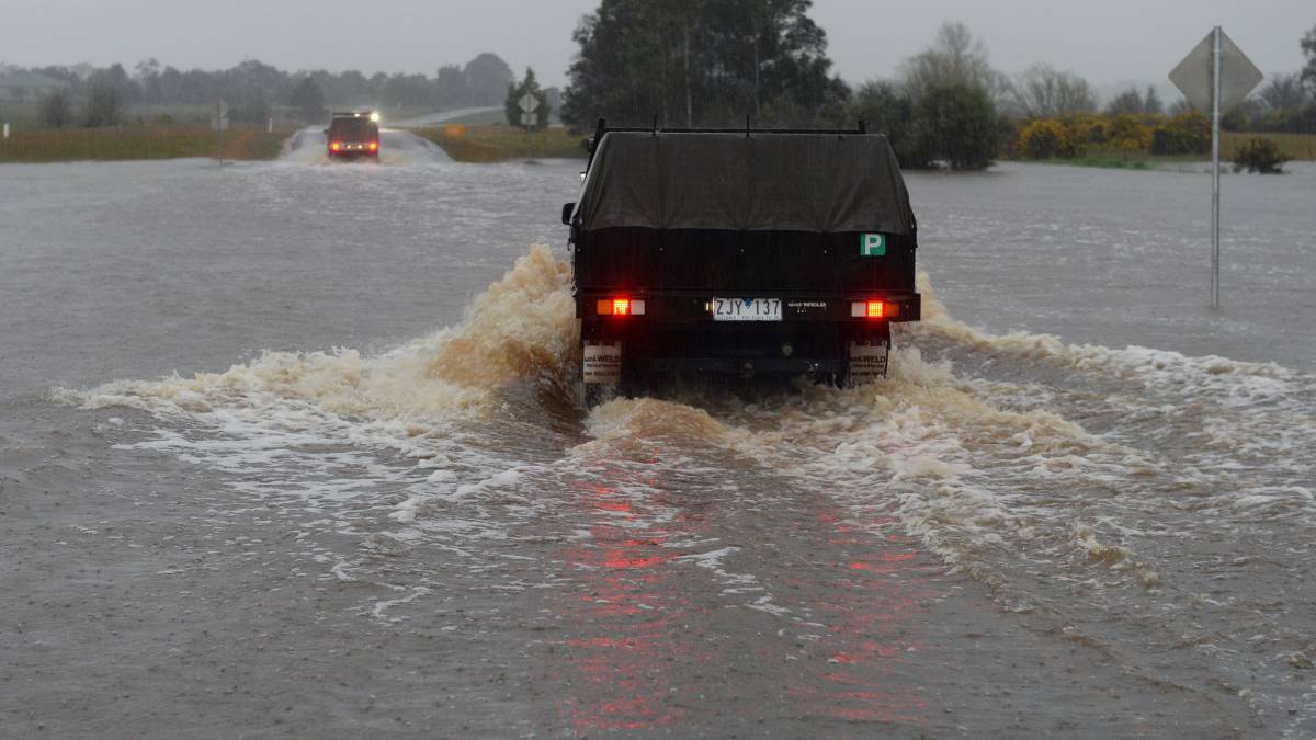 A motorist takes the plunge. Picture: Kate Healy