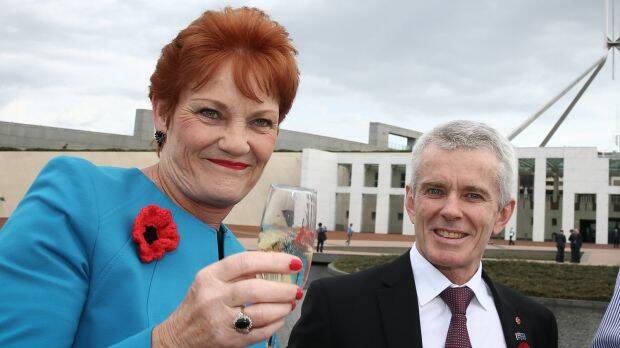 Senator Pauline Hanson with Senator Malcolm Roberts at Parliament House. Photo: Alex Ellinghausen
