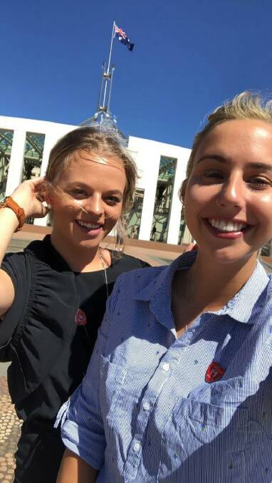 Claire Hollinworth and her housemate, friend and fellow heart patient Courtney Green at Parliament House on Wednesday.