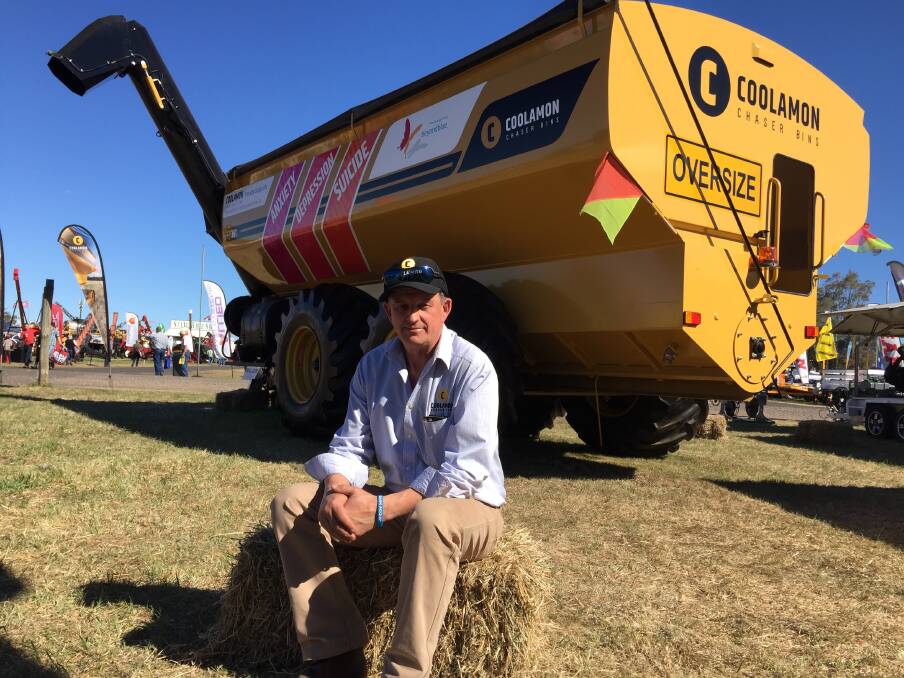 CHASING WELLNESS: Coolamon Chaser Bins sales manager Peter Munro at AgQuip. Photo: Carolyn Millet 240817CMC01