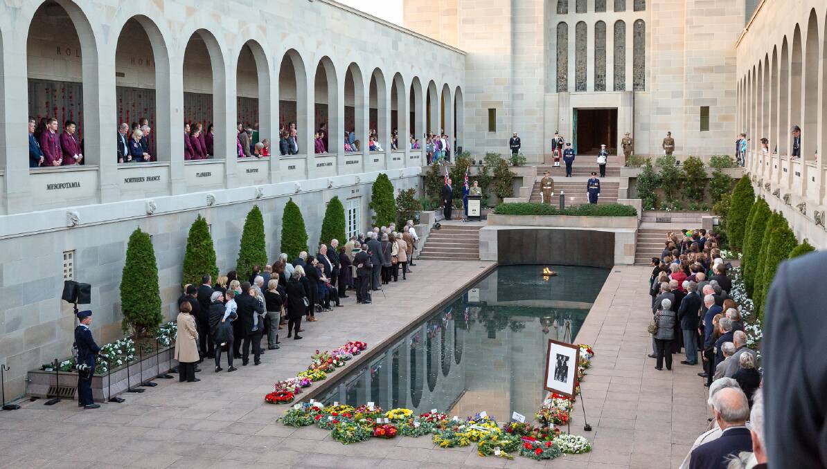 Tribute: The Last Post ceremony in honour of Gordon Sharp at the Australian War Memorial. Photo: Steve Keough