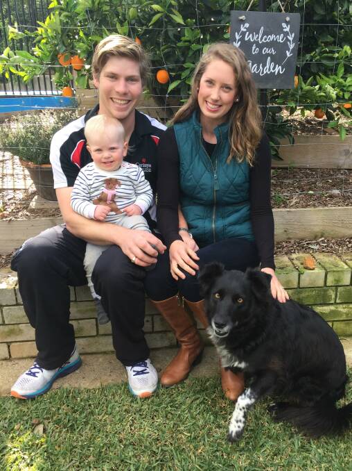 HOME, SWEET HOME: Charles, Lara and Colette Bickersteth, with dog Poppy in their Calala backyard. Photo: Carolyn Millet