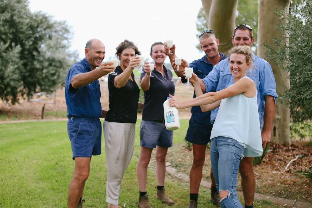 CHEERS: Steve and Erika Chesworth, Danielle and Duncan Chesworth, and Emma and Jim Elliott toast their success.