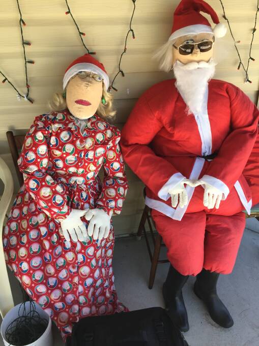 Mrs and Mr Claus outside Barb's home.
