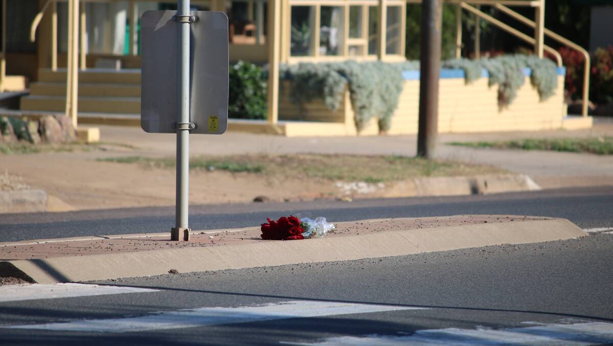 TRAGIC: Flowers at the pedestrian crossing in Gunnedah.