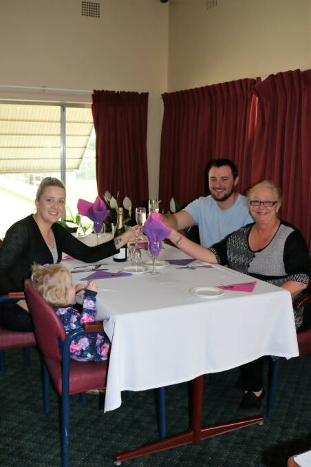 HERE'S CHEERS: From left, Imogen, Teleah and Thomas Michell raise a glass to Mother's Day with Irma McKenzie at the North Tamworth Bowling Club.