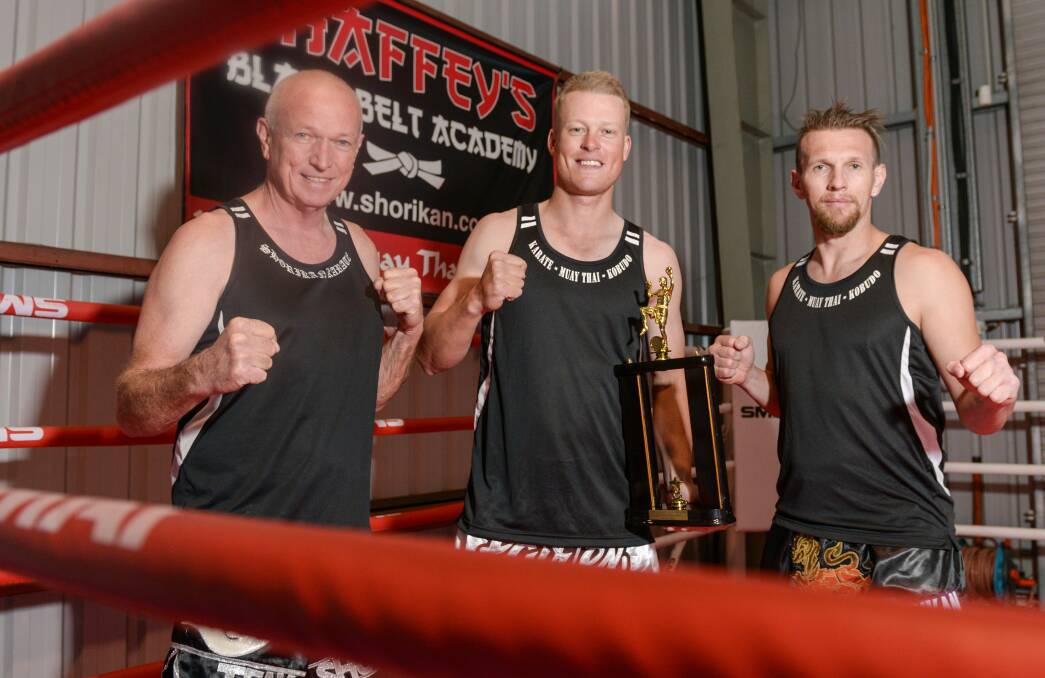 Next Generation: Clint Chaffey with his latest champion Muay Thai fighter Mitch Reeves and his trainer Scott Chaffey back into it after claiming the trophy last weekend.