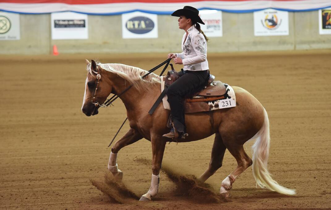 Whoa: Lisa Teets pulls her horse up in style at the AELEC for the Gold Buckle reining Futurity held over the weekend. Photos: Gareth Gardner