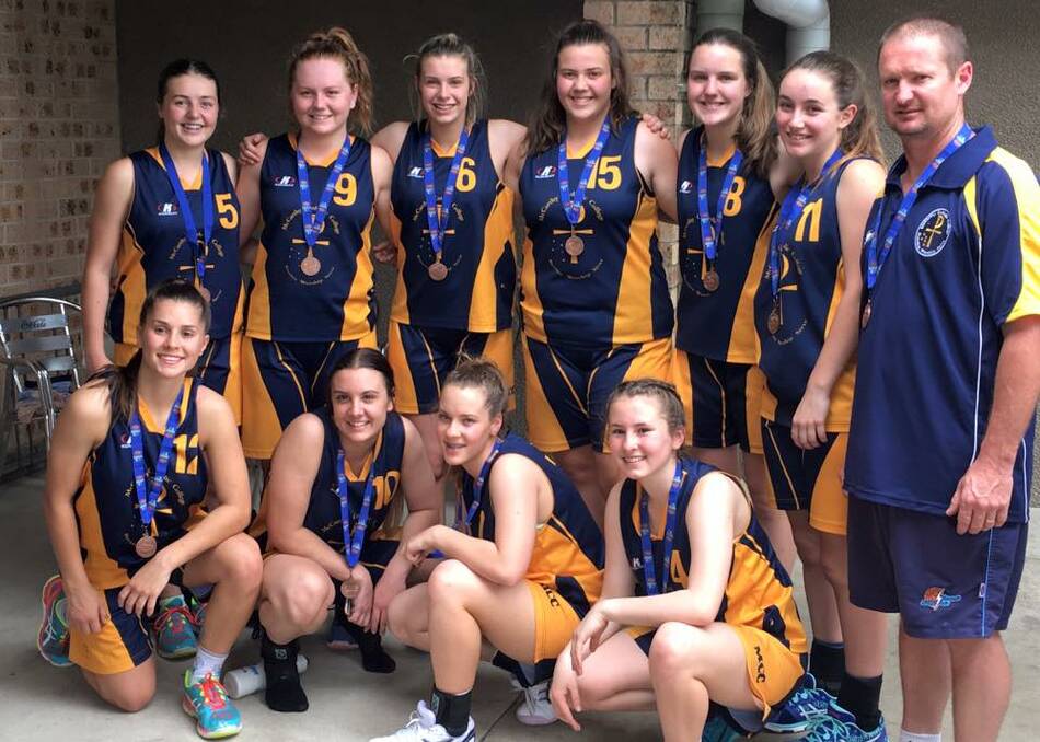 Bronze: The McCarthy senior girls basketball team came away from the Catholic School State Championships with a bronze medal.