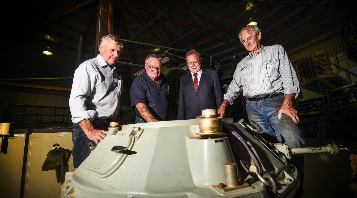 Happy snappers: Members of the Tamworth Astronomy Club Phil Betts, Kevin Morrison, Michael McHugh and Raymond McLaren inspect the Hewitt Camera after recieving it from the Coonabarabran Observatory last year. Photo: Gareth Gardner 120117GGF02