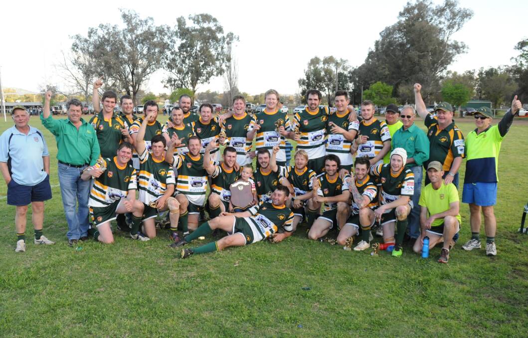 Top paddock: The Walcha Roos celebrate a grand final victory and dual premierships after cleaning up both grades on the big day.