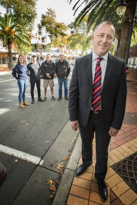 Hands up: Business Chamber president Jye Segboer and Peel street operators Jill Stewart, Adrian Coffey, Roger Cupples and Norm Hindmarsh have put their hands up to take over the management of the street during festival.