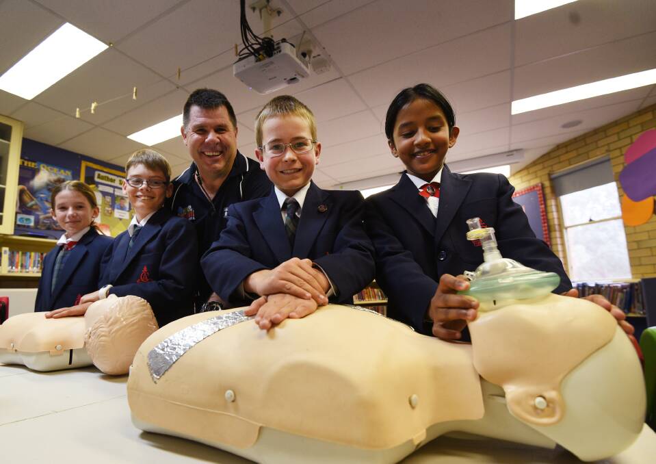 Staying alive: William Cowper student's Alyvia Wilson, Jake Hebblewhite, Alistair Scott and Vinethmi Balasuriya learn a real life lesson from Cameron McFarlane.