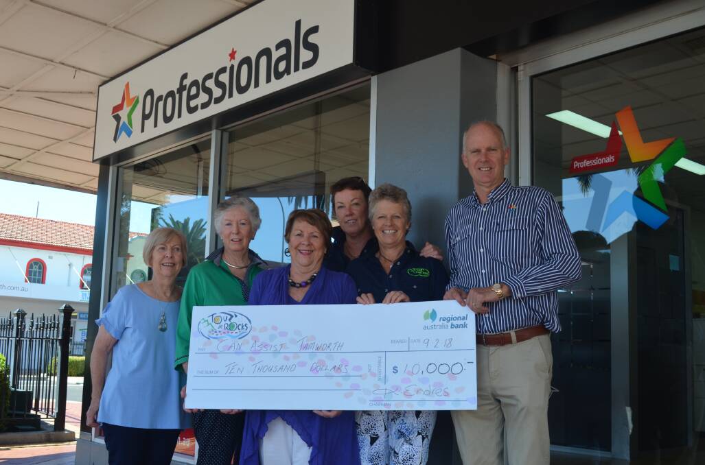 Cheque and challenge: Can Assist's Fay Clark, Jeanette Melville, Robyn Fitzgerald and Brett White (right), accept a donation from Kay Endres and Pip White.