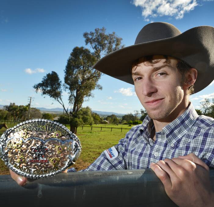 Ride em: Local cowboy Bradie Gray displays his PBR rookie of the year buckle that he earnt with a brilliant two month stint on the circuit that also earnt him a sponsorship deal and a $5000 cash purse.