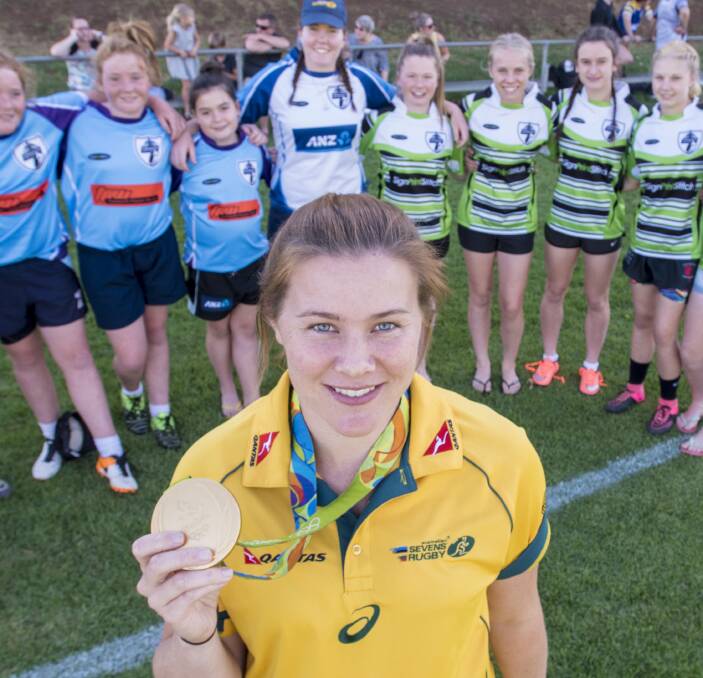 Winning smile: Aussie sevens star and Rio gold medalist Nicole Beck was still beaming when she dropped into Tamworth on Friday night as the special guest at the inaugural Club 7s final. Photo: Peter Hardin 091216PHA022