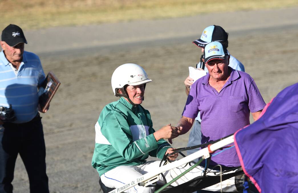 Winners: Ian "Spud" Verning makes a presentation to Stacey Weidemann after the driver won the Perc Verning Memorial with Fours Enuf Tas.