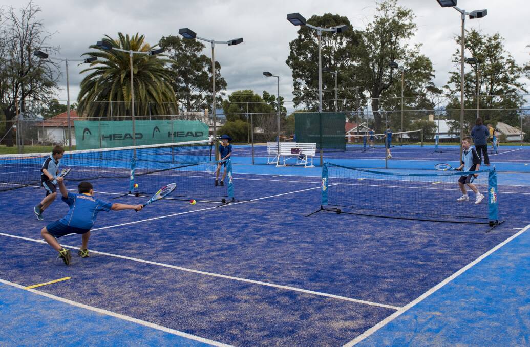 Action aplenty: There was plenty of action at the Todd Woodbridge Cup day with the primary school kids making the most of the new court surfaces.