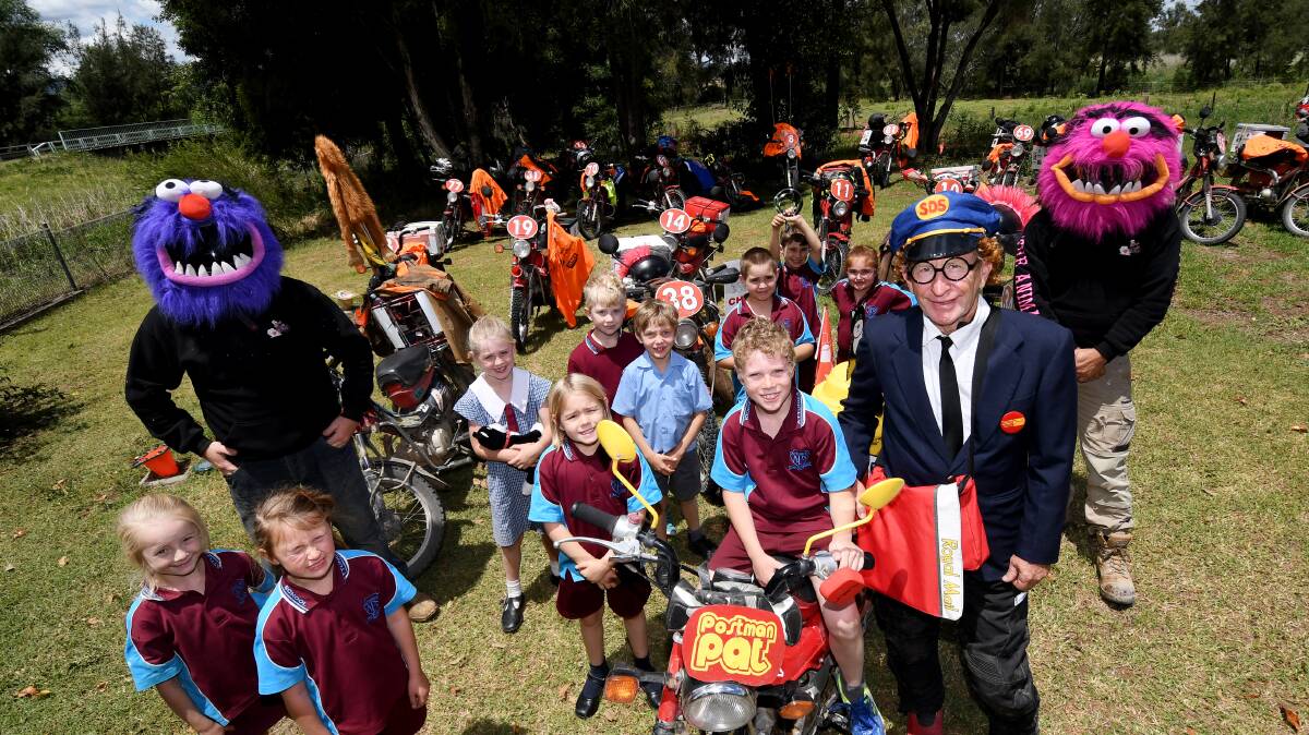 Special delivery: Students at Attunga Public School met 39 'postmen' on Wednesday who are out to make a difference. Photo: Gareth Gardner 081117