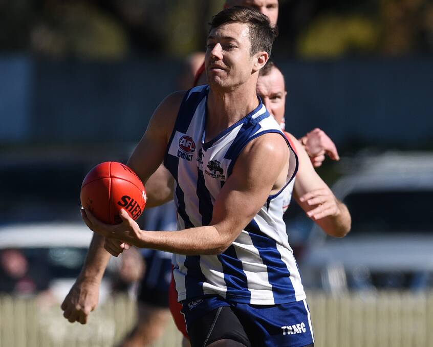  Brock Quinn handballs for the Roos and will have to be in good form if the Roos want to beat Inverell on Saturday.
