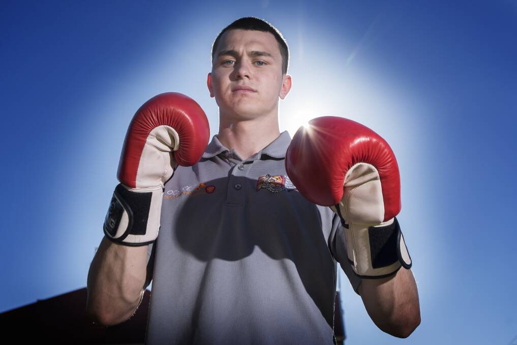 Message from the champ: Australian Amateur and Golden Gloves title holder Jacob Stanton hopes his inspirational story can inspire other disadvantaged kids as he chases Olympic gold. Photo: Peter Hardin 240717